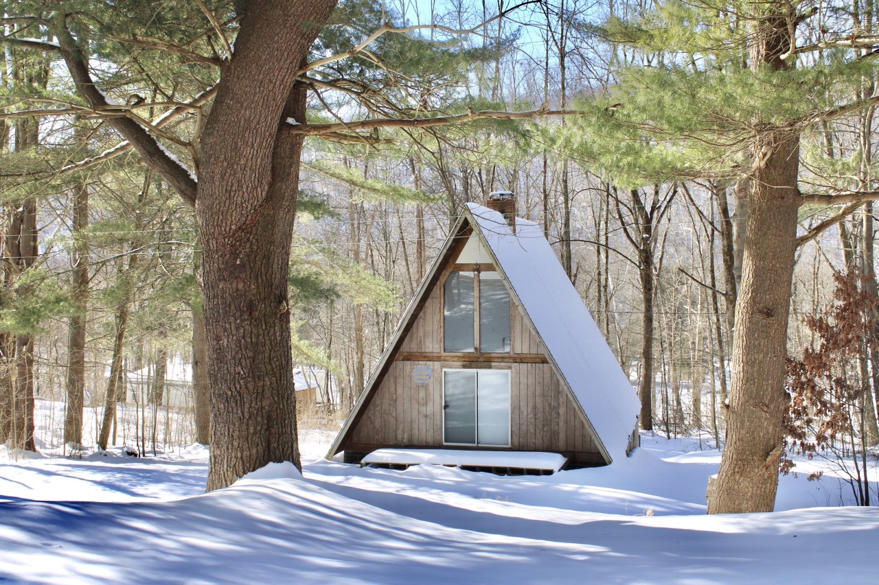 Aframe cabin exterior before — a barely functional hunters cabin in the woods